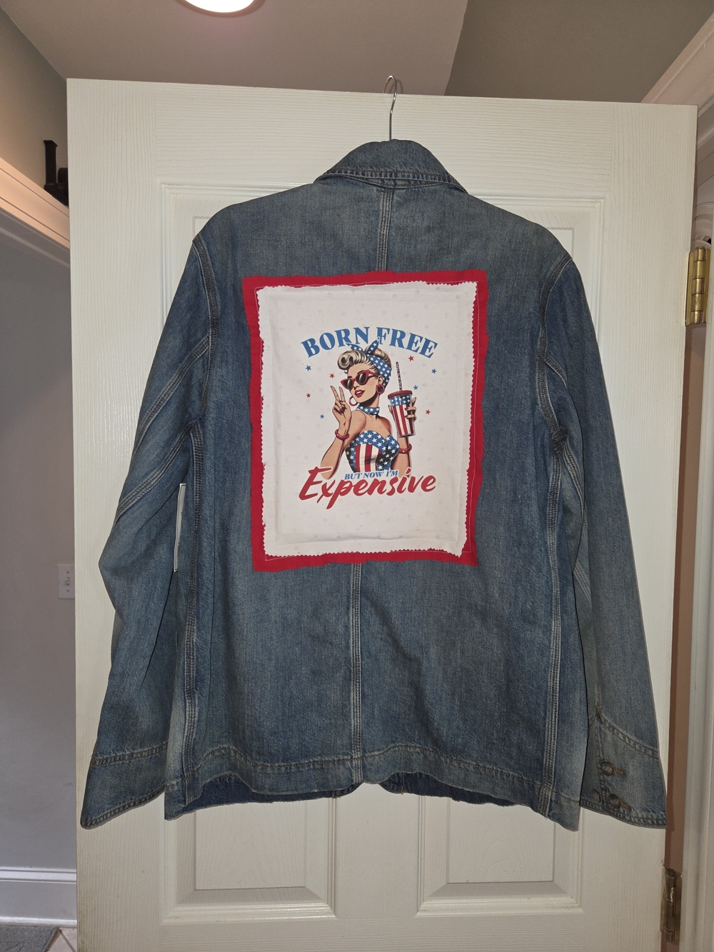 Upcycled Lee Blue Denim Jacket with Red & White 'Born Free' Graphic Patch